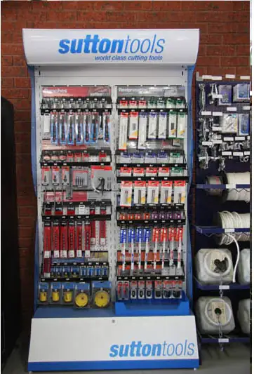 A stand of Sutton drill bits and cutting tools