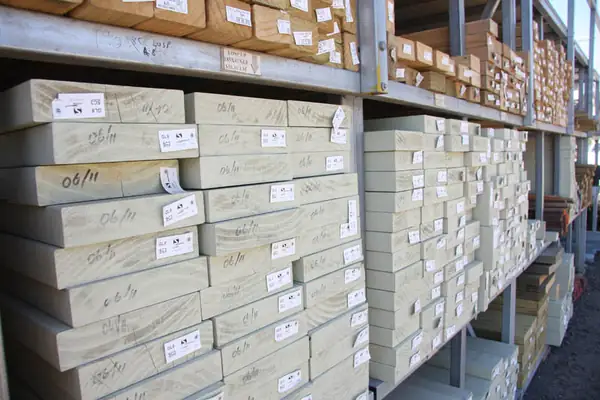 Wrapped timber packs stacked on the shelves